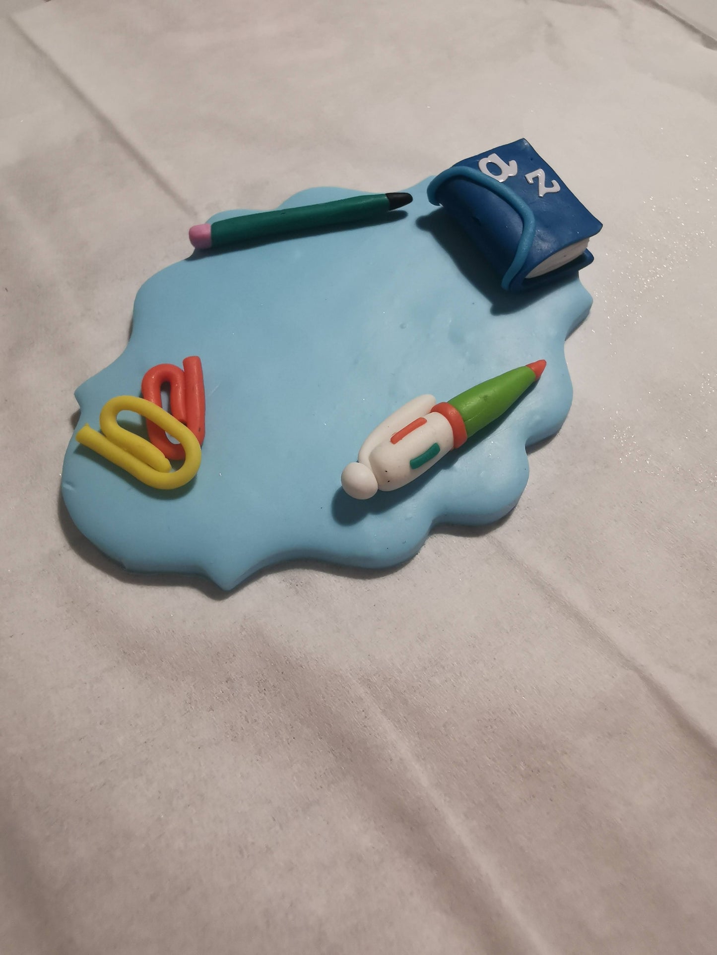 Badge métier personnalisé en pâte polymère (Fimo)
